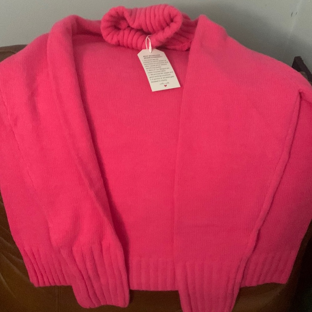 Pink turtleneck sweater